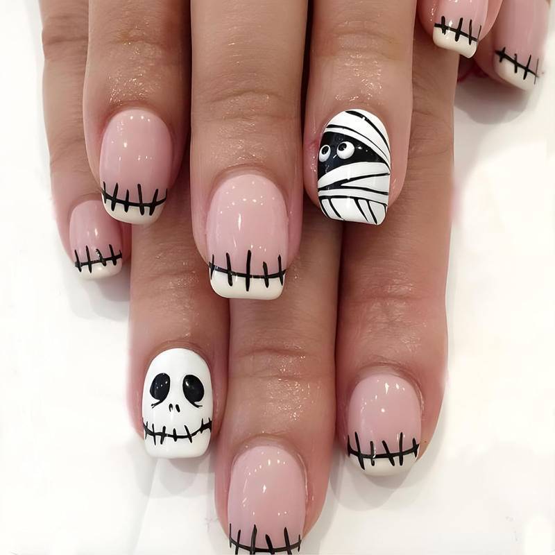 lot 64641 image: Halloween Press on Nails Short Square Fake Nails with Mummy Skeleton Designs White French Tip Nails Press ons Acrylic Stick on Nails for Women 24Pcs