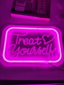 lot 64287 image: 12 x 8 inch neon sign. Pink mounting hardware included