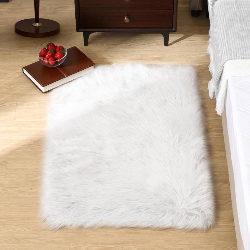 lot 50387 image: Goolela White Fluffy Faux Fur Rug for Bedroom Faux Sheepskin Rug 2x3 White Fuzzy Furry Bedside Carpet Dining Room Playroom Dorm Small Washable Rectangle - Retail $17