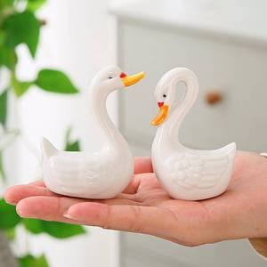 lot 41605 image: Lifexquisiter 2PCS Ceramic White Swan Figurines Cake Toppers, Elegant Swan Couple Statues, Modern Minimalist Art Knick Knacks for Home Office Dresser Shelf Shelves Fireplace Decor - Retail $15