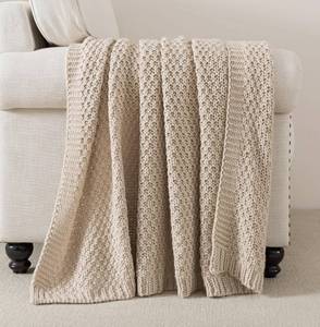 lot 48672 image: WDCOZY Chunky Cable Knit Throw Blanket Super Soft Warm Knitted Throw Blanket for Couch, Sofa, Chair, Bed Lightweight Breathable Cozy Comfortable Home Decorative Camel Tan Beige 60x80 Inches - Retail $40