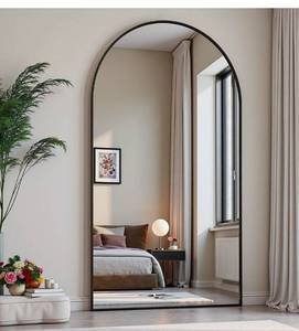 lot 20746 image: Arched Full Length Mirror, 71x30 Large Floor Mirror, Full Body Mirrors for Leaning or Hanging, Standing Mirrors for Bedroom, Living Room,Dressing Room, Aluminum Alloy Frame, Black - Retail $139