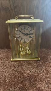 lot 60612 image: Glass Carriage Clock with Brass Rotating Balls - Retail $25