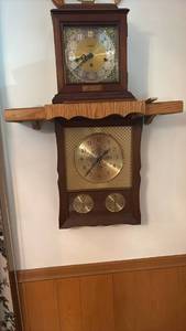 lot 60637 image: Howard Miller Mantel Clock and Wall Clock Set with Wooden Shelf - Retail $150