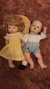 lot 60690 image: Two Baby Dolls with Basket and Original Clothing - Retail $15