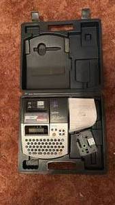 lot 60702 image: Brother P-Touch Label Maker with Case and Supplies - Retail $25