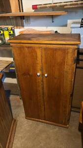 lot 60728 image: Wooden Storage Cabinet with Double Doors and Adjustable Shelves - Retail $75