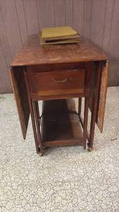 lot 60744 image: Mid-Century Drop Leaf Table with Drawer and Table Mats - Retail $75