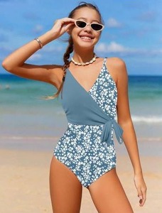 lot 1086 image: Girls Blue Floral One-Piece Wrap Swimsuit Size- 9-10Y