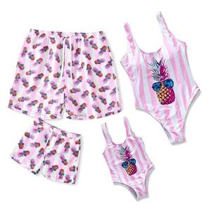 lot 1184 image: IFFEI Family Matching Mommy and Me Swimsuits One Piece Swimwear Modest Bathing Suits Beachwear for Beach Pool Vacation Pink (MEN- LARGE  WOMEN- SMALL)