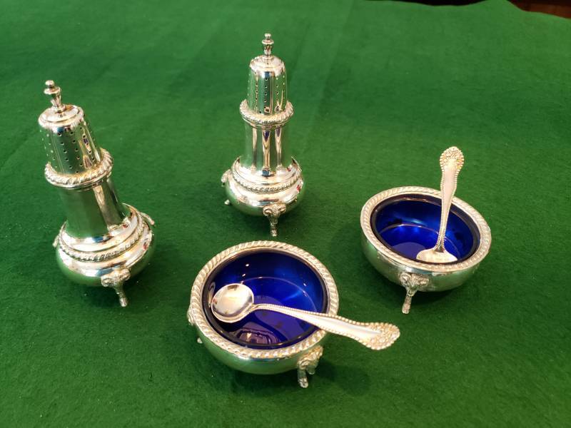 lot 5022 image: Sterling silver salt and pepper shakers and (2) dishes