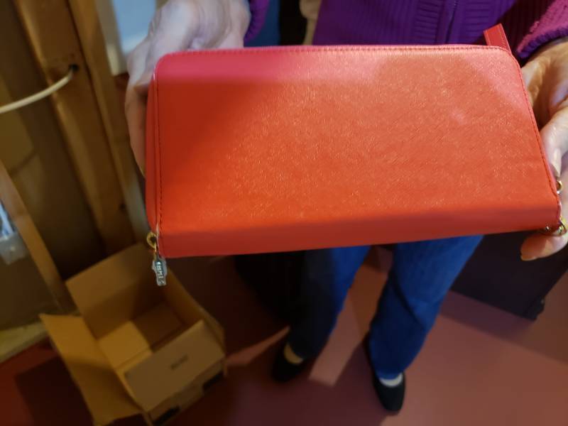 lot 5089 image: Purse with built in I phone cell phone charger