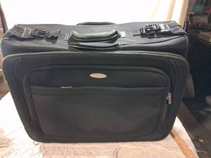 lot 57 image: Samsonite 1910 Black Soft Shell Rolling Suitcase