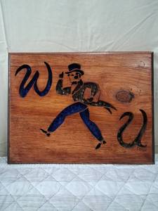 lot 78 image: Handcrafted Wooden Wall Sign with Character Design