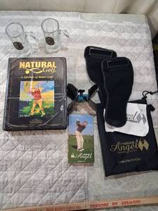 lot 99 image: Golf Training Collection with Instructional Videos and Equipment