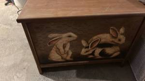 lot 40031 image: Wooden Storage Cabinet with Carved Rabbit Design