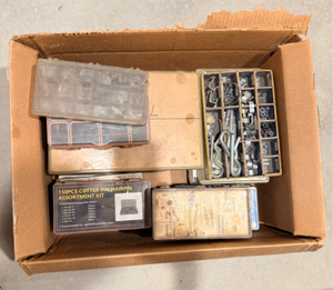 lot 76 image: Box of assorted small engine repair parts. Stihl, cotter pins, set screws, gaskets, weights, e-clips, pins, throttle cables, washers