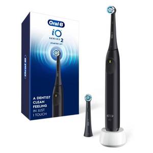 lot 16571 image: Oral-B Rechargeable Electric Toothbrush, iO2 Starter Kit, 3 Cleaning Modes, Automatic Pressure Sensor to Protect Gums, 2 Brush Heads, Night Black - Retail $50
