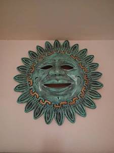 lot 904 image: 22 inch diameter Turquoise Sun.  Made of plaster