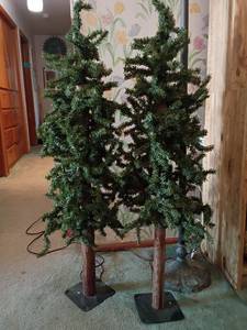 lot 918 image: 2 Artificial Trees on Stands. Approximately 50in. tall