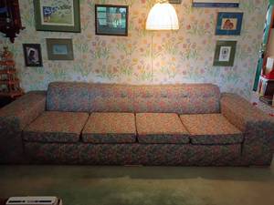 lot 920 image: Couch by Allens Furniture.   Extra long, Leaf Pattern.  25 x 117 x 41
