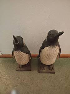 lot 932 image: 2 Wooden Penguins.  Tallest is 23 in.