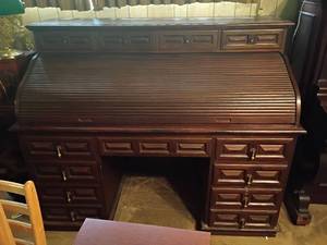 lot 947 image: Rolltop Desk.  14 drawers.  Green granite or marble in middle of desktop.   Top needs light repair.   48 x 60 x 30