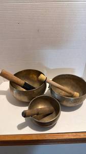 lot 1013 image: Tibetan singing bowls with striker sticks