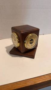lot 1030 image: American black walnut rotating weather station clock