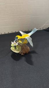 lot 1084 image: Norman Brumm bird enamel on copper on wood signed