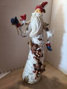 lot 1098 image: Handcrafted Santa Claus on Birch Log with Cardinals and Squirrels, 20in tall