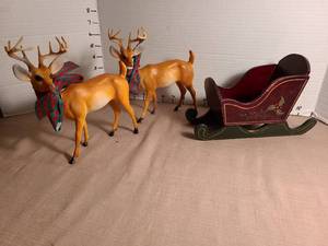 lot 1104 image: Vintage Christmas Doe Figurines made of hard plastic with Santa Sleigh