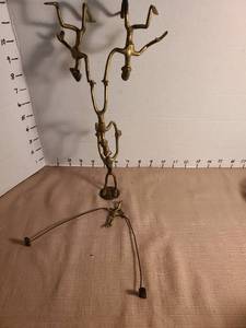 lot 1128 image: African acrobatic sculpture in brass