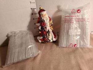 lot 1142 image: Santa ornament made in Poland and 2 full bags icicle ornaments
