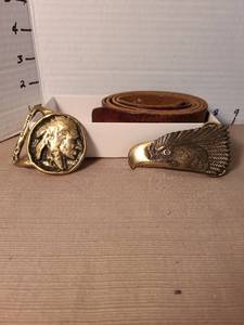 lot 1162 image: Brass buckles with leather belt.