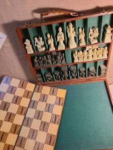 lot 1166 image: Carved Stone Chess Set with Playing Board in Leather Case