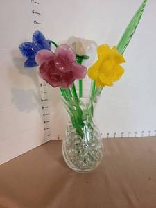 lot 1167 image: Glass flowers and petals in glass vase.