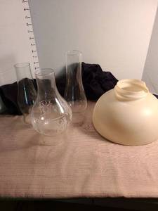 lot 1197 image: Mixed Oil Lamp Chimney and Shade Collection, white one is broken