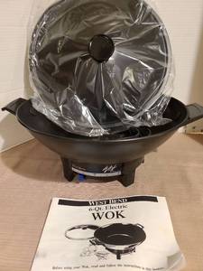 lot 1203 image: West Bend 6-Qt Electric Wok with Lid and Manual, never used
