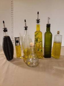 lot 1231 image: Glass oil and vinegar bottle collection