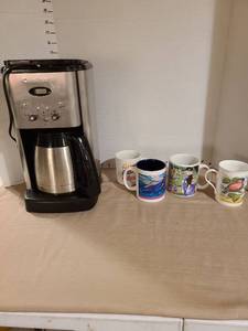 lot 1234 image: Cuisinart coffee maker and mugs