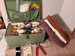 lot 1302 image: Sewing notions and fabric.