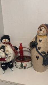 lot 1407 image: Two Decorative Snowmen with Holiday Basket. Tallest is 24 inches and has been glued.