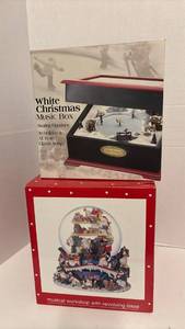 lot 1431 image: NIB Christmas Music Box with Skating Figurines and Snow Globe