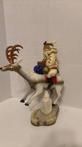 lot 1448 image: Anthony Costanza Spirit of Christmas Santa on Reindeer Figurine