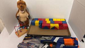 lot 1456 image: Plush Dinosaur, Building Blocks, Activity Toy and Nerf Blaster