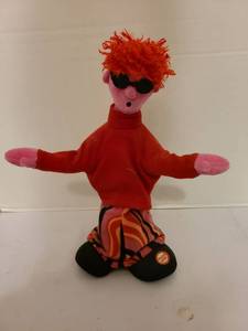 lot 1459 image: Dancing Musical Plush Doll with Orange Hair