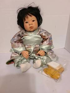 lot 1460 image: Asian Baby by Lee Middleton