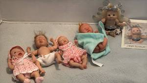 lot 1537 image: Clay Polymer Realistic Baby Dolls with Hand-Knitted Outfits