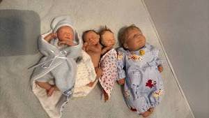 lot 1540 image: Reborn Baby Dolls with Clothing and Blankets - Set of 4